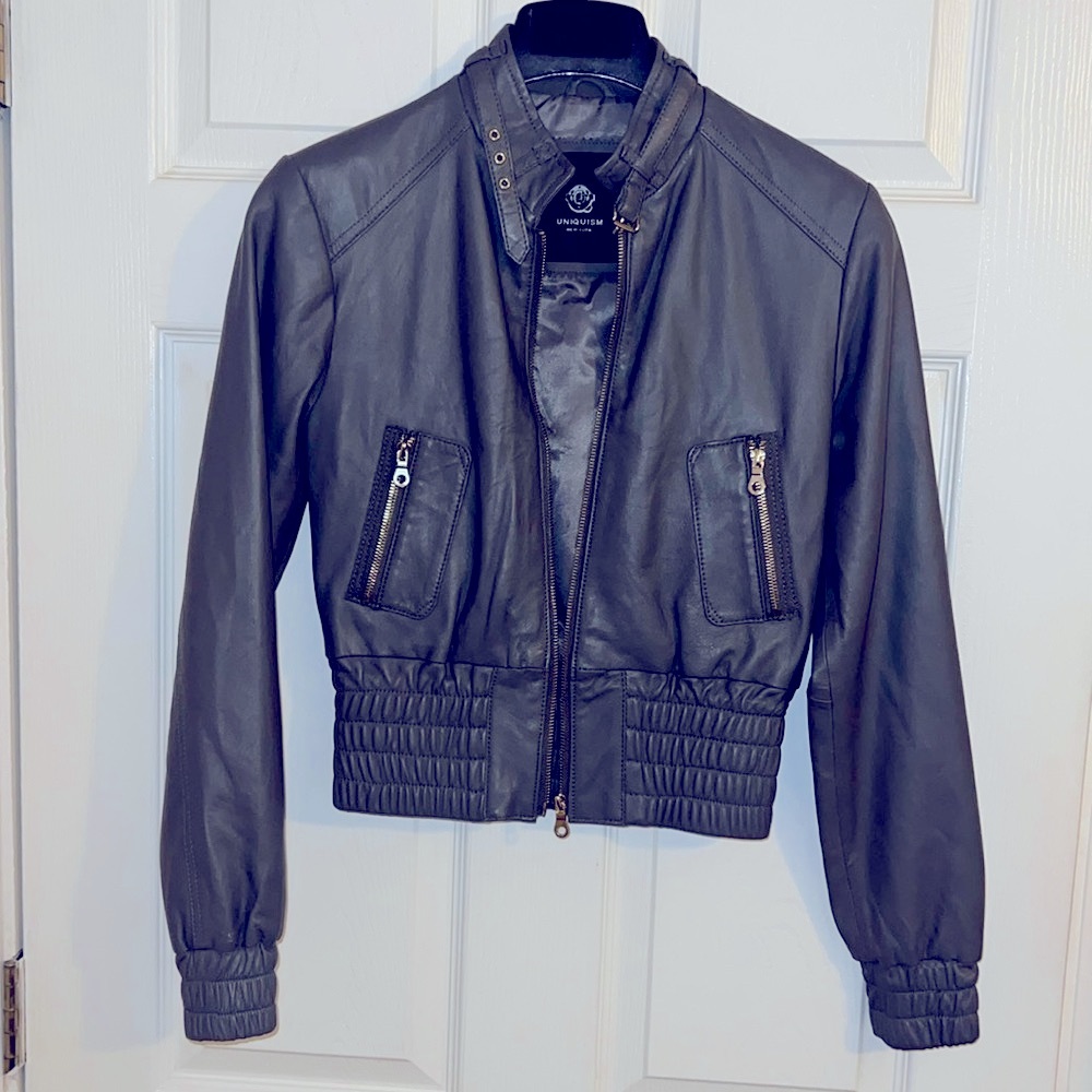 Uniquisim XS Shell 100% Lambskin                  100% Polyester